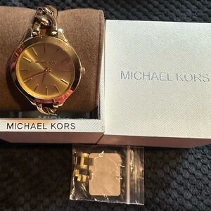 Michael Kors Gold chain bracelet watch.